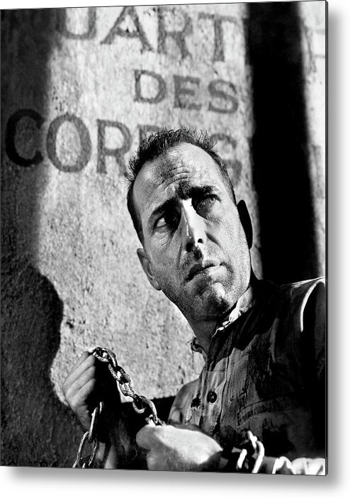 Humphrey Bogart Metal Print featuring the photograph HUMPHREY BOGART in PASSAGE TO MARSEILLE -1944-, directed by MICHAEL CURTIZ. by Album