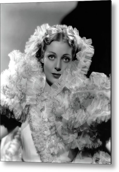 Loretta Young Metal Print featuring the photograph LORETTA YOUNG in CARAVAN -1934-, directed by ERIK CHARELL. by Album