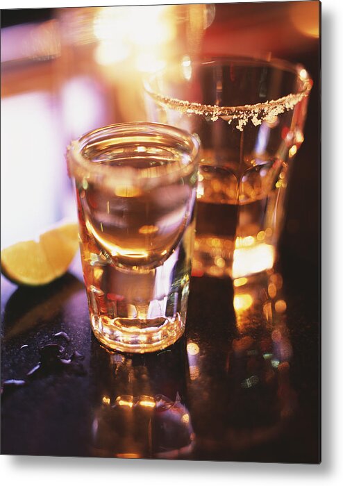 Alcohol Metal Print featuring the photograph Tequila shots on the bar with salt and lime by Lisa Romerein
