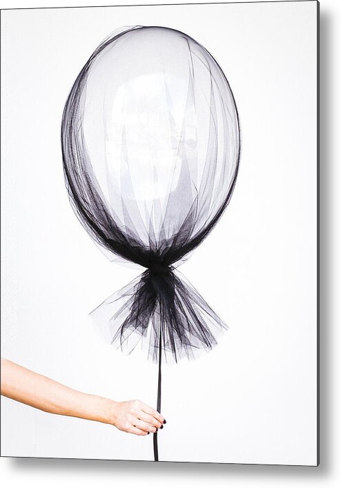 Fragility Metal Print featuring the photograph Woman hand holding balloon by David Cruz / FOAP