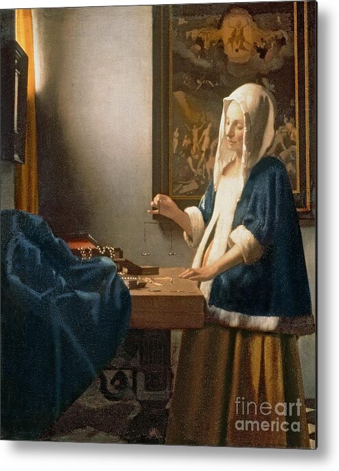 jan vermeer woman holding a balance