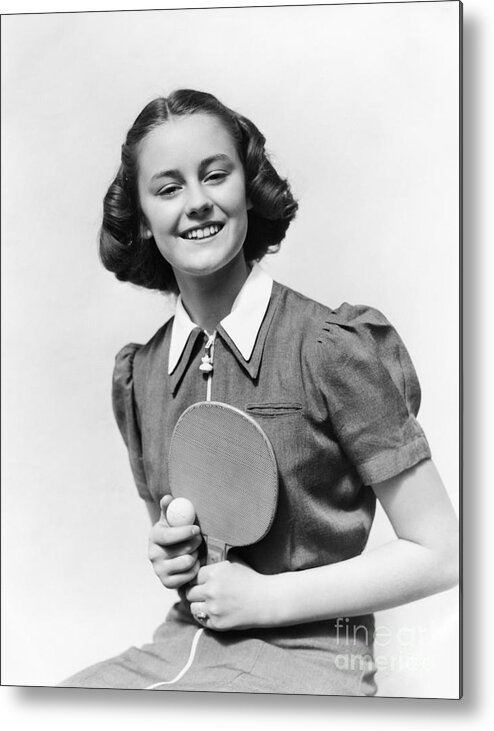 1940s Metal Print featuring the photograph Girl With Table Tennis Paddle And Ball by H. Armstrong Roberts/ClassicStock
