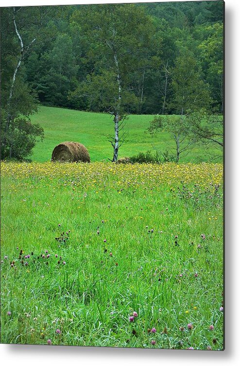 Joy Metal Print featuring the photograph Round Bale and Wildflowers by Joy Nichols