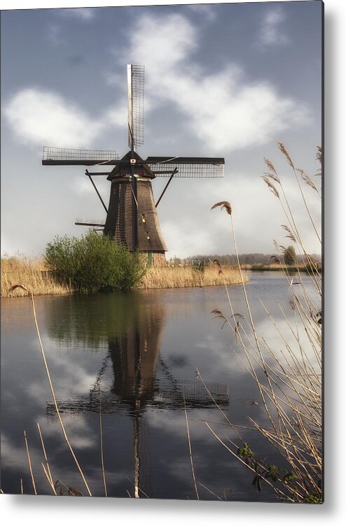 Windmill Metal Print featuring the photograph Windmill at Kinderdijk in Holland by Tim Abeln