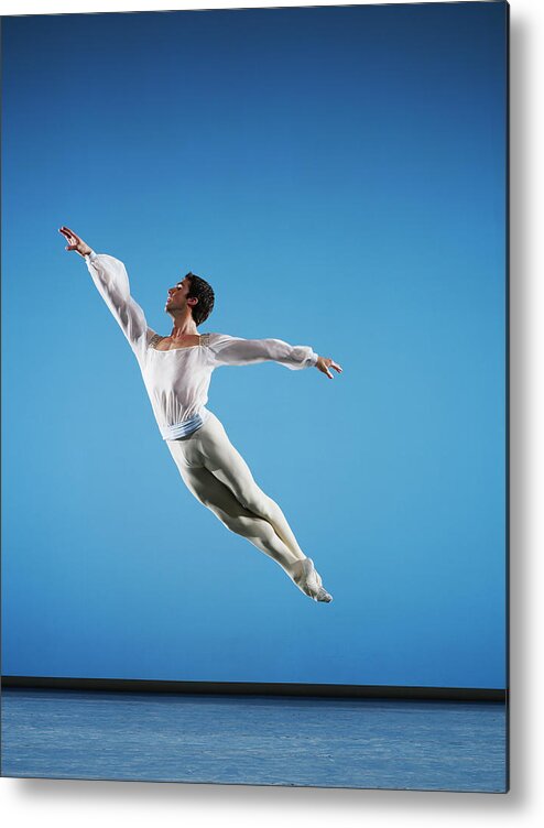 Ballet Dancer Metal Print featuring the photograph Male Ballet Dancer Leaping On Stage #1 by Thomas Barwick