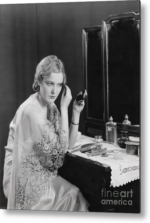 Zurich Metal Print featuring the photograph Actress Miriam Seegar At Vanity Table by Bettmann