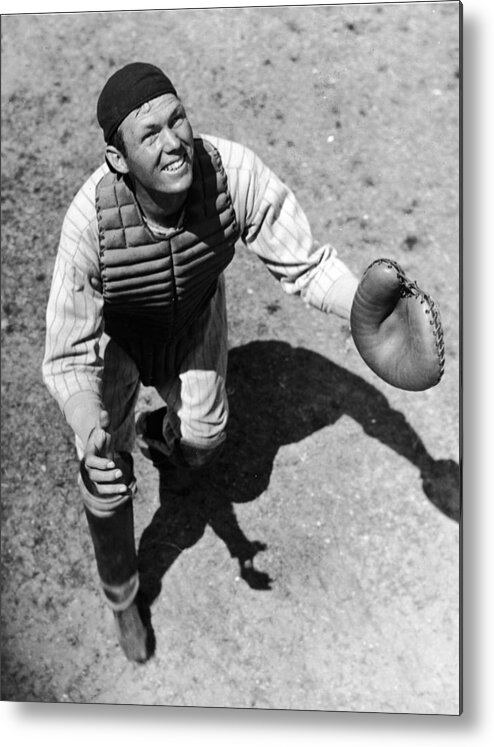 American League Baseball Metal Print featuring the photograph Bill Dickey Waits On A Foul Ball by Fpg