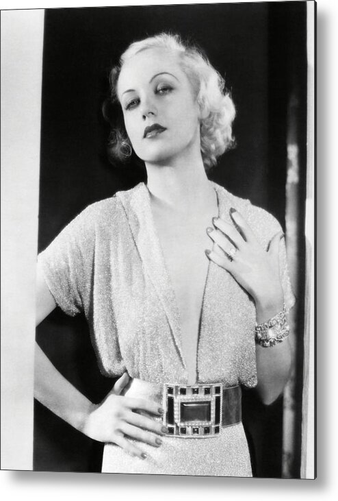Carole Lombard Metal Print featuring the photograph CAROLE LOMBARD in NO MAN OF HER OWN -1932-. by Album