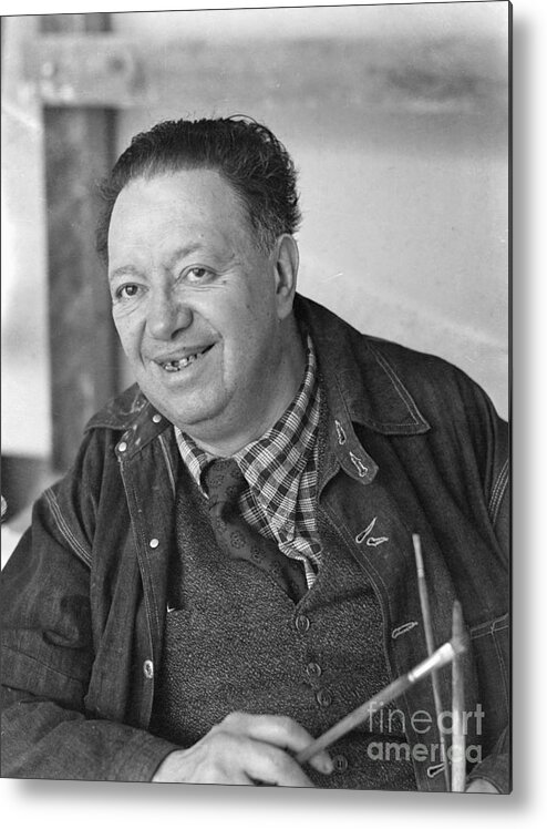 People Metal Print featuring the photograph Diego Rivera Standing In Front by Bettmann