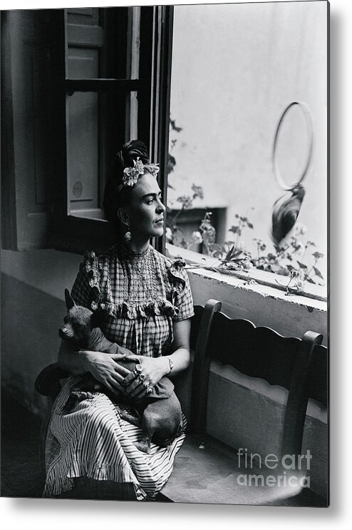 Pets Metal Print featuring the photograph Frida Kahlo Holding Her Dog by Bettmann