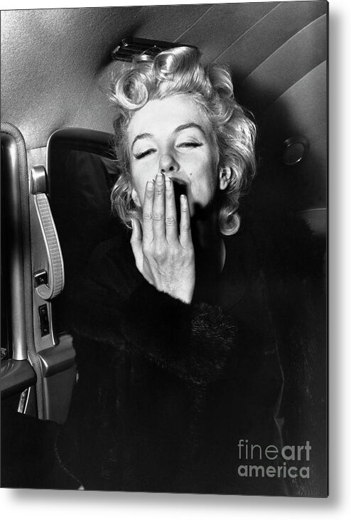 Mid Adult Women Metal Print featuring the photograph Marilyn Monroe Blowing A Kiss by Bettmann