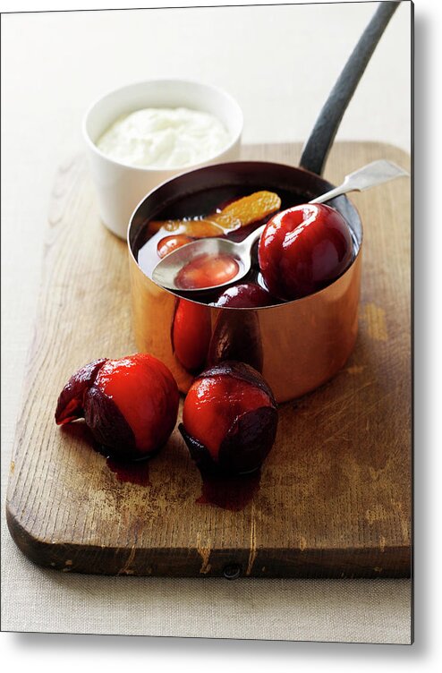 Plum Metal Print featuring the photograph Pot Of Stewed Plums On Board by Brett Stevens
