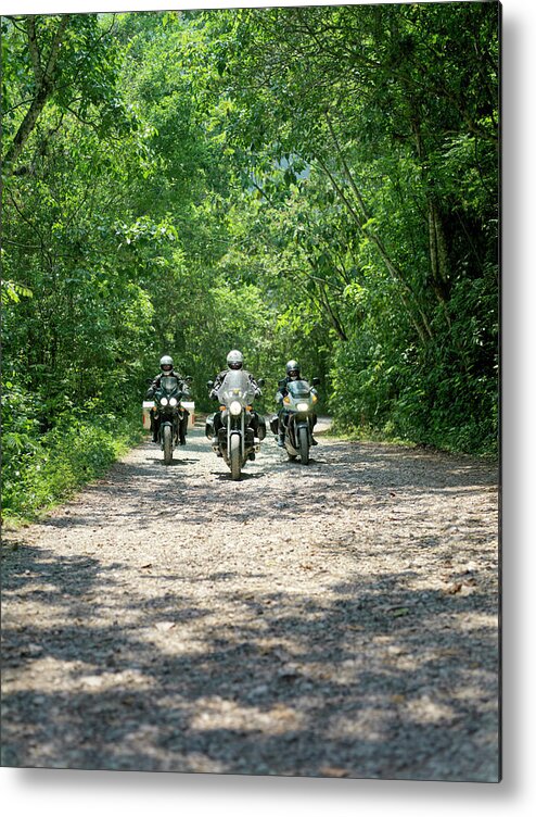 Crash Helmet Metal Print featuring the photograph Three Men Riding Motorbikes Along by Xpacifica