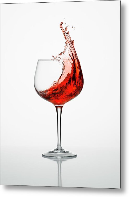 White Background Metal Print featuring the photograph Wine Splash In A Glass by Don Farrall