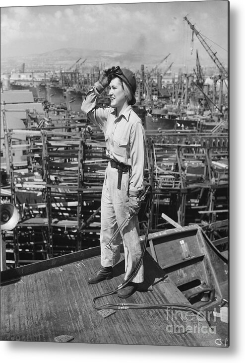 Headwear Metal Print featuring the photograph Woman Working At Shipyard by Bettmann
