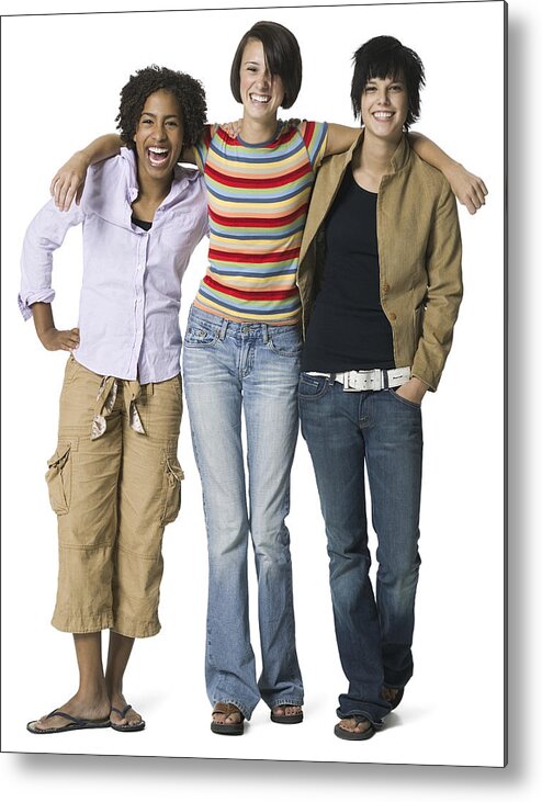 Cool Attitude Metal Print featuring the photograph Full Length Shot Of A Group Of Three Teenage Female Friends As They Smile At The Camera by Photodisc