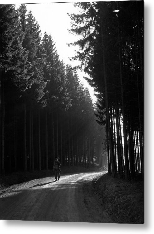 Battle Of The Bulge Metal Print featuring the photograph Soldier Walking Through The Forest - Battle Of The Bulge - 1944 by War Is Hell Store