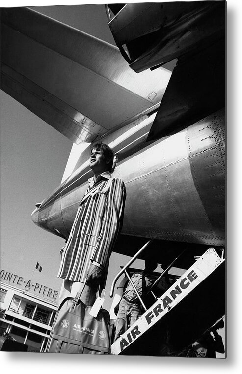 Fashion Metal Print featuring the photograph A Model By An Air France Airplane by Richard Steedman