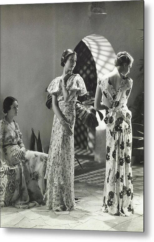 Fashion Metal Print featuring the photograph Models Wearing Floral Print Dresses by George Hoyningen-Huene