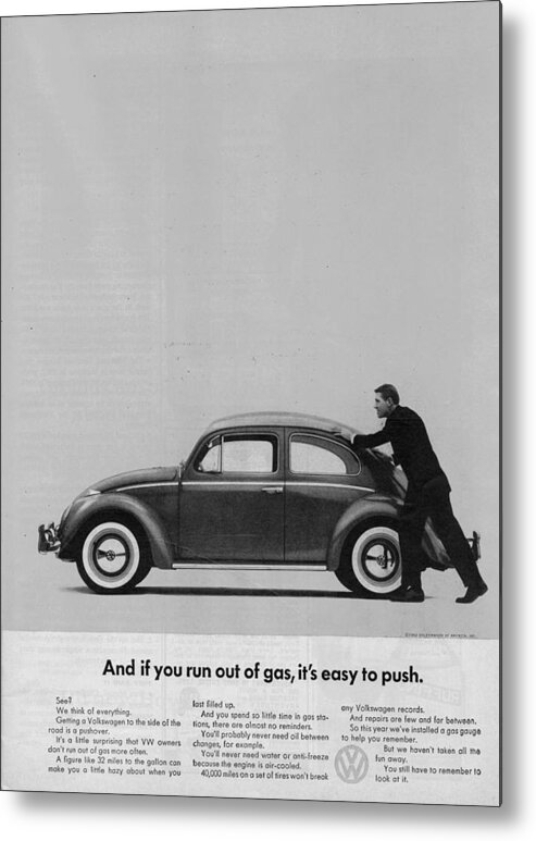 Vw Beetle Metal Print featuring the digital art VW Beetle Advert 1962 - And if you run out of gas it's easy to push by Georgia Fowler