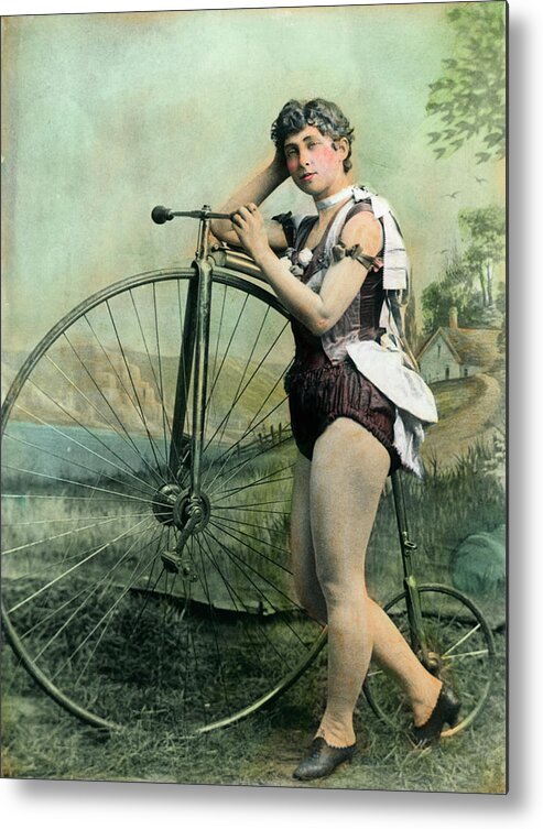 People Metal Print featuring the photograph Female Circus Performer With Bicycle by Bettmann