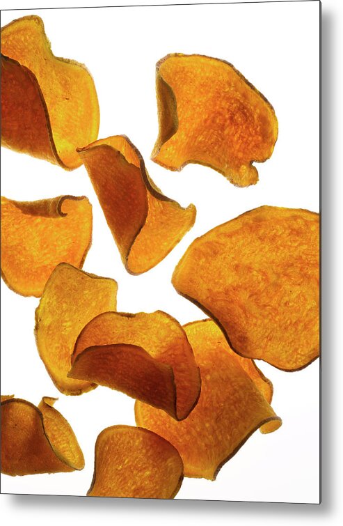 Unhealthy Eating Metal Print featuring the photograph Flying Sweet Potato Chips by Howard Bjornson