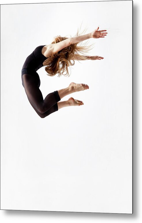 Human Arm Metal Print featuring the photograph Modern Dancer Jumping In The Air by Jonya