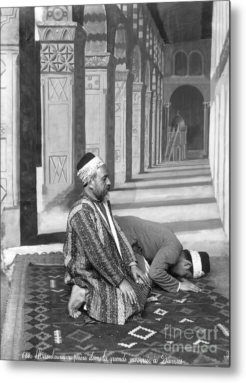 Rug Metal Print featuring the photograph Muslim Men Posing In Prayer by Bettmann