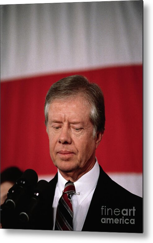 1980-1989 Metal Print featuring the photograph President Jimmy Carter Conceding Defeat by Bettmann