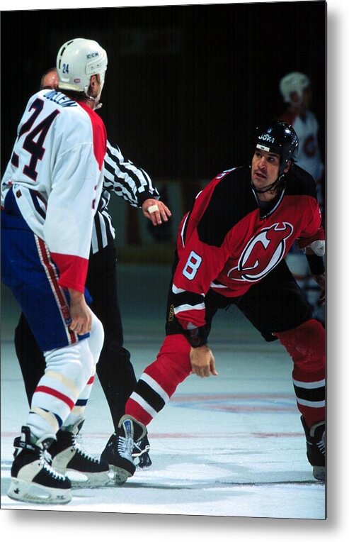 National Hockey League Metal Print featuring the photograph Odelein fights Peluso by R Laberge