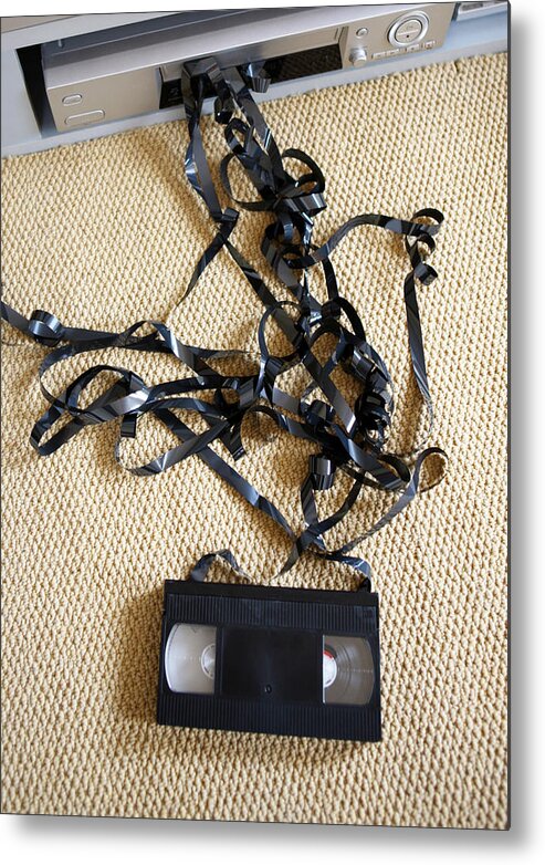 Damaged Metal Print featuring the photograph Stuck Video Tape by Richard Newstead