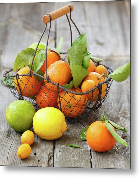 Large Group Of Objects Metal Print featuring the photograph Citrus In A Basket by Julia Khusainova