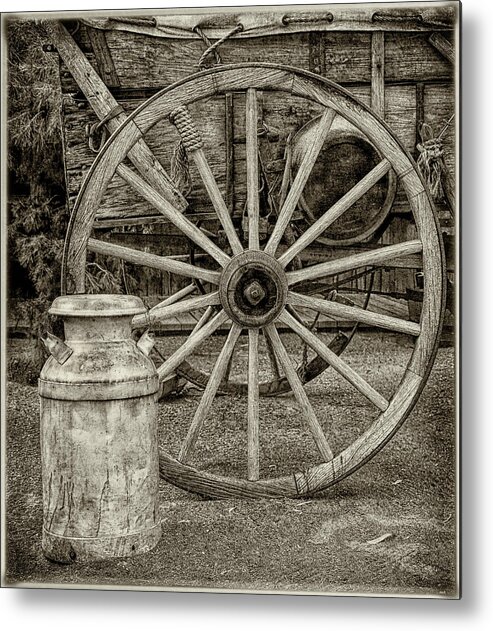 Wagons Metal Print featuring the photograph Wagon Wheels by Elaine Malott