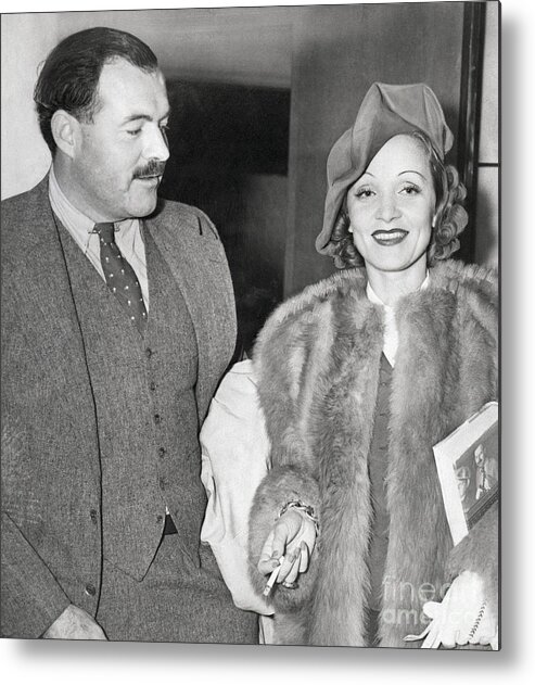 Smoking Metal Print featuring the photograph Ernest Hemingway And Marlene Dietrich by Bettmann