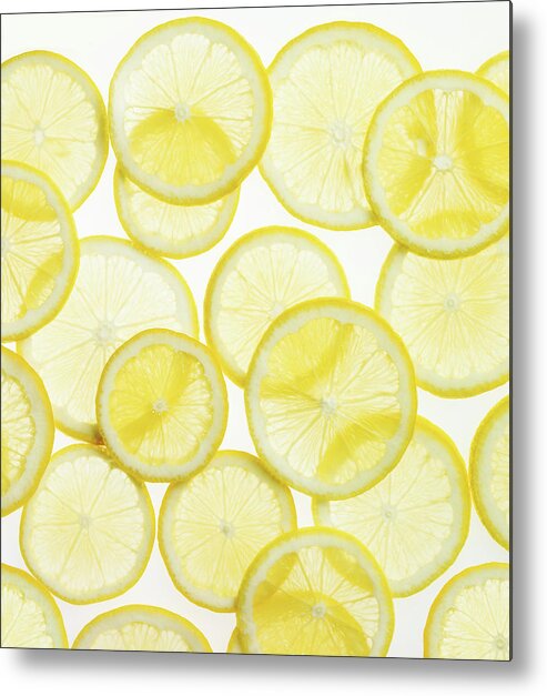 White Background Metal Print featuring the photograph Lemon Slices Arranged In Pattern by Lauren Burke