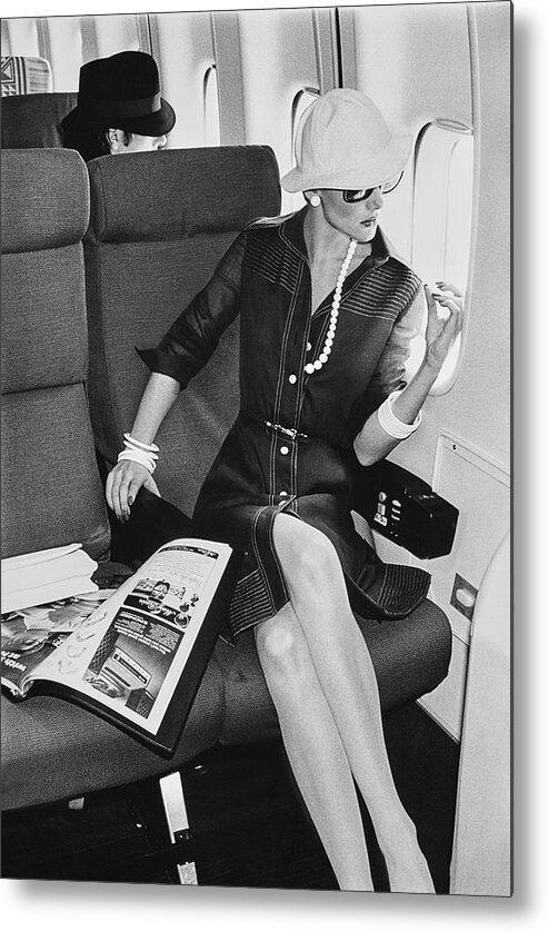 Accessories Metal Print featuring the photograph A Model Looks Wearing Abe Schrader On An Airplane by Chris von Wangenheim