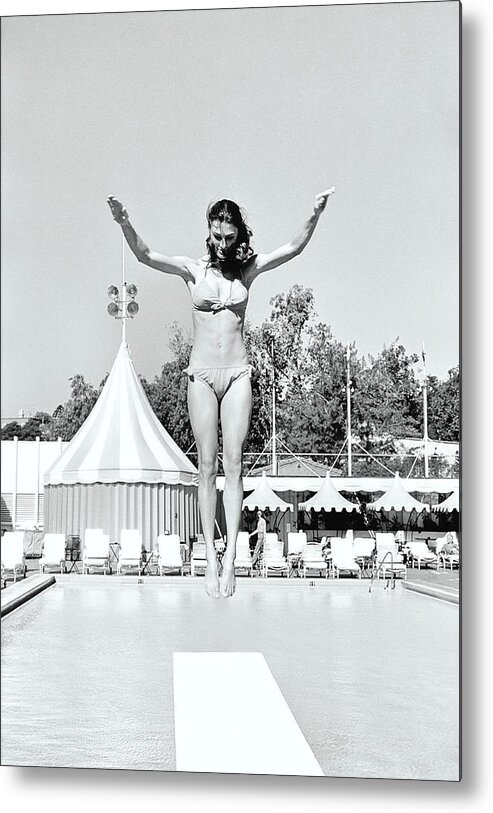 Personality Metal Print featuring the photograph Donna Garrett Jumping On Diving Board by William Connors