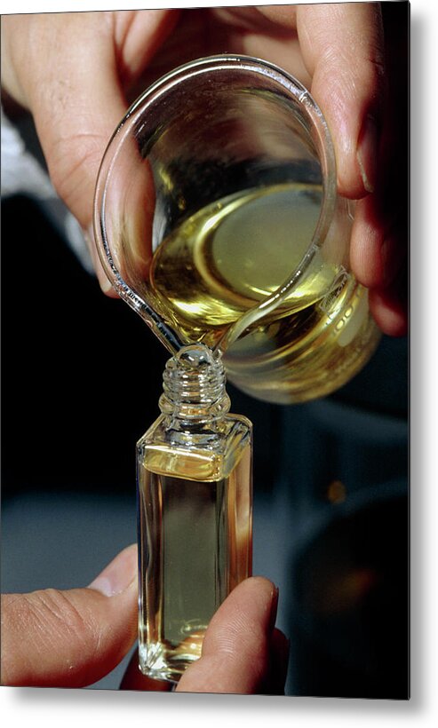 Beaker Metal Print featuring the photograph Filling A Sample Bottle With Perfume From A Beaker by Klaus Guldbrandsen/science Photo Library