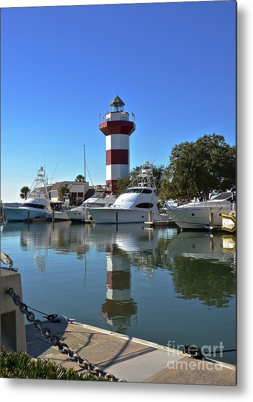 Lighthouse Metal Print featuring the photograph Harbor Town Lighthouse by Carol Bradley