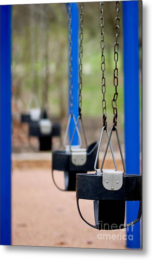 Childhood Metal Print featuring the photograph Swings in a Row Shallow DOF by Amy Cicconi