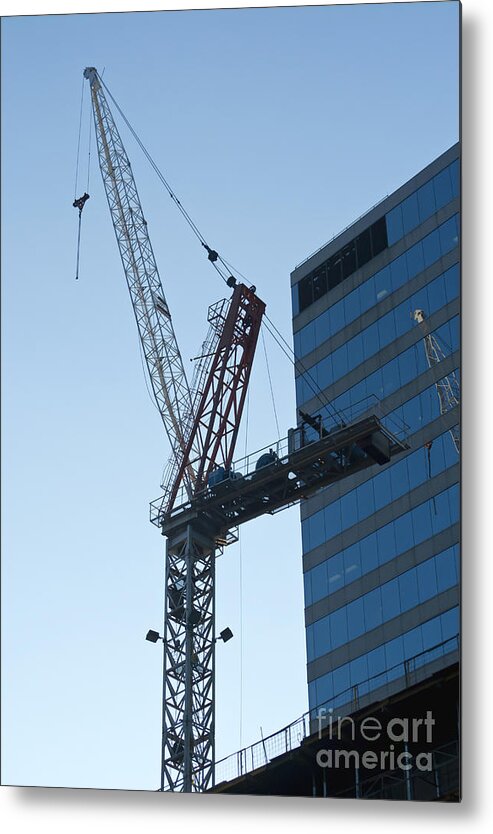 Crane Metal Print featuring the photograph Building crane #1 by Blink Images
