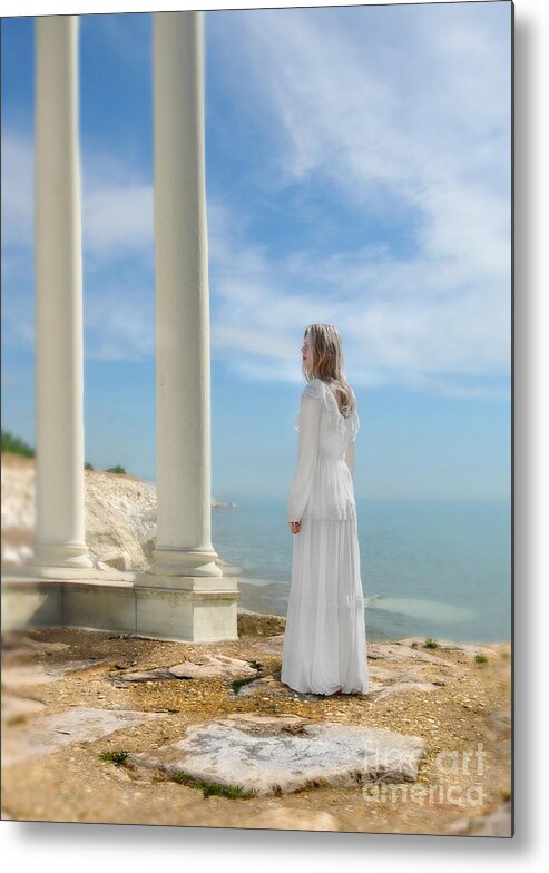 Walking Metal Print featuring the photograph Lady in White by the Sea by Jill Battaglia