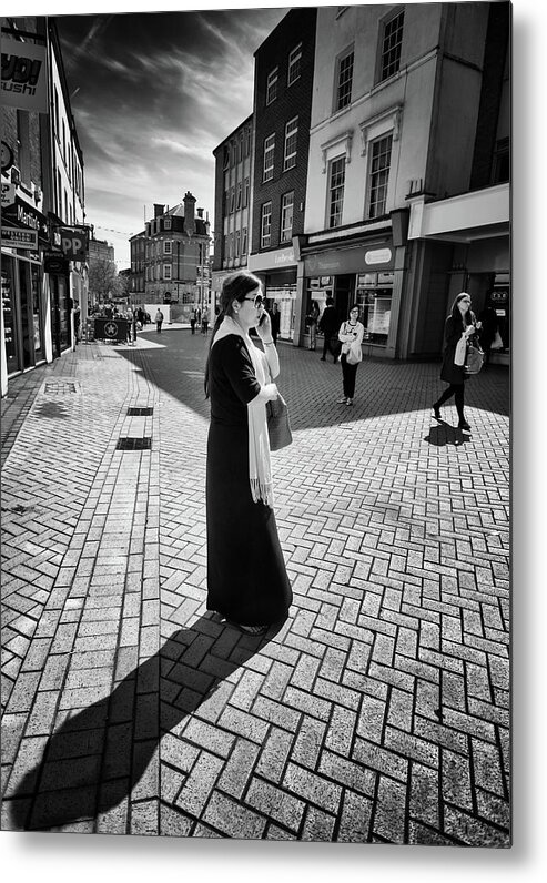 Women Metal Print featuring the photograph The Woman Her Phone and Diagonal Shadow by John Williams
