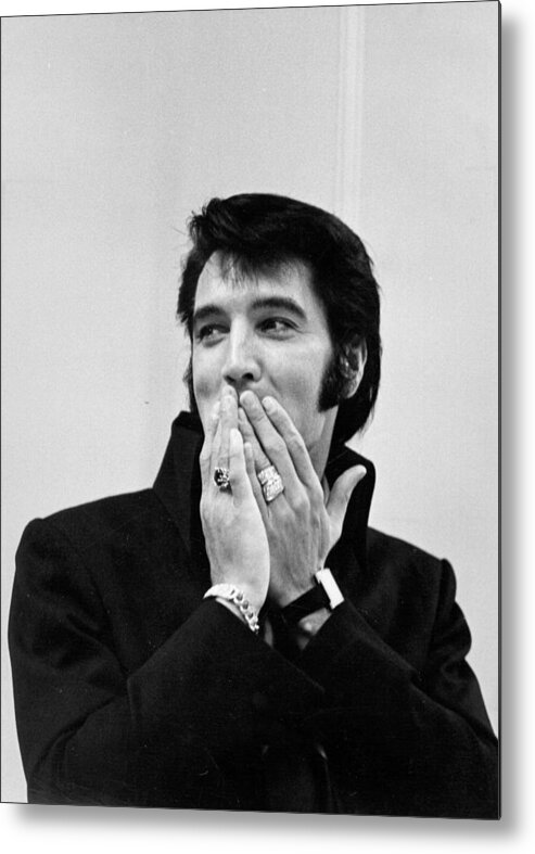 Elvis Presley Metal Print featuring the photograph Rock And Roll Musician Elvis Presley by Michael Ochs Archives