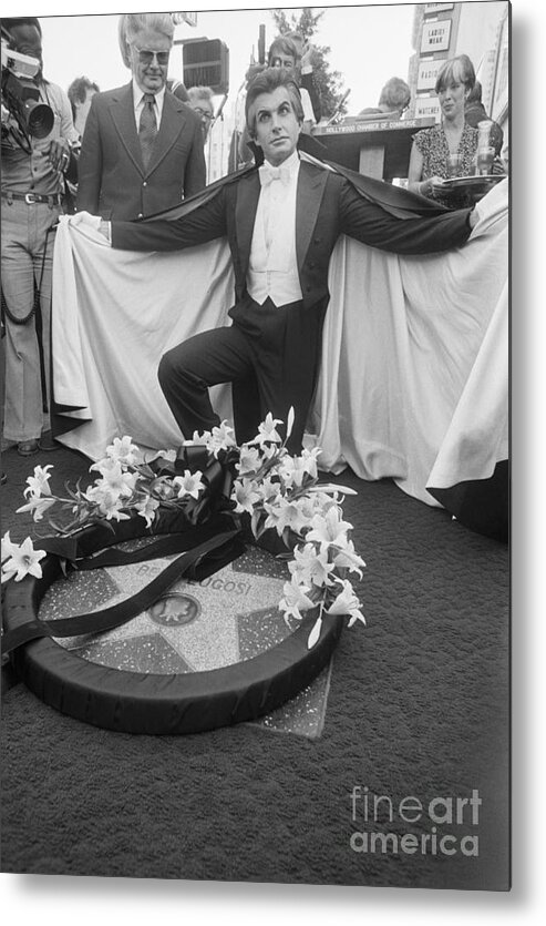 People Metal Print featuring the photograph Actor George Hamilton Places Wreath by Bettmann