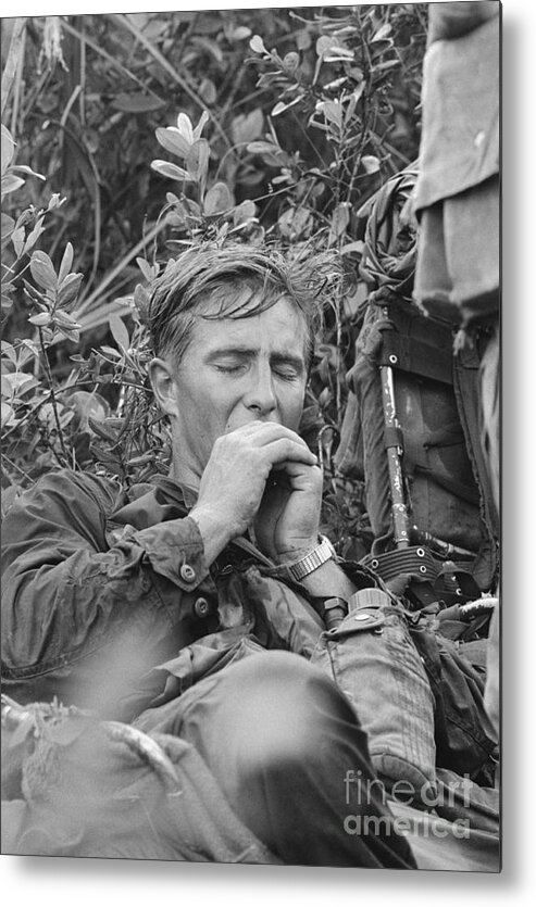 Vietnam War Metal Print featuring the photograph American Soldier In Vietnam Yawning by Bettmann