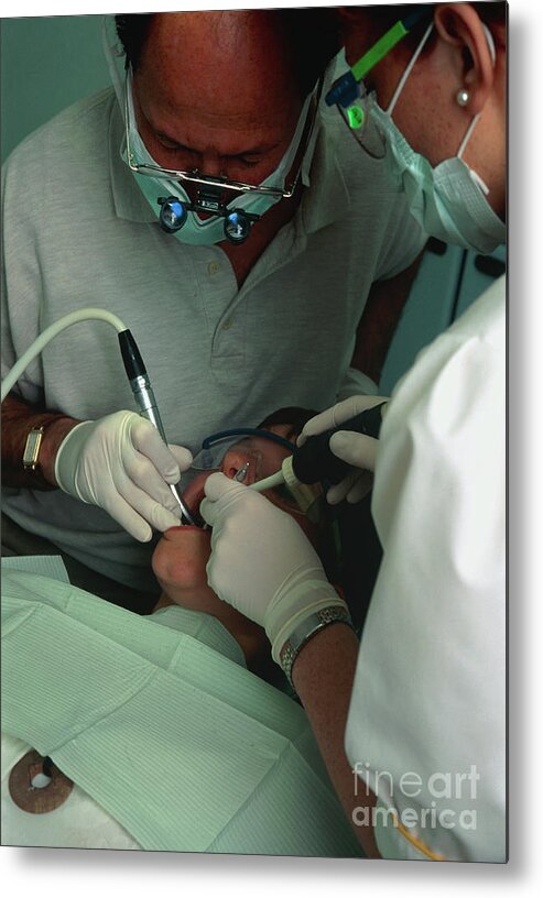 Drill Metal Print featuring the photograph Dentist And Assistant Drilling A Woman's Teeth by Francoise Sauze/science Photo Library