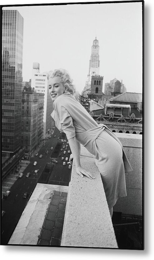 Marilyn Monroe Metal Print featuring the photograph Marilyn On The Roof by Michael Ochs Archives