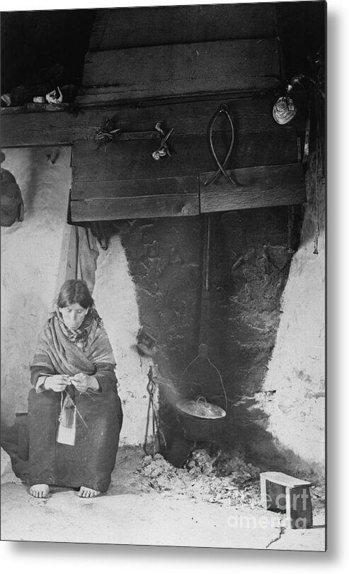 People Metal Print featuring the photograph Old Irish Woman By Fireplace by Bettmann