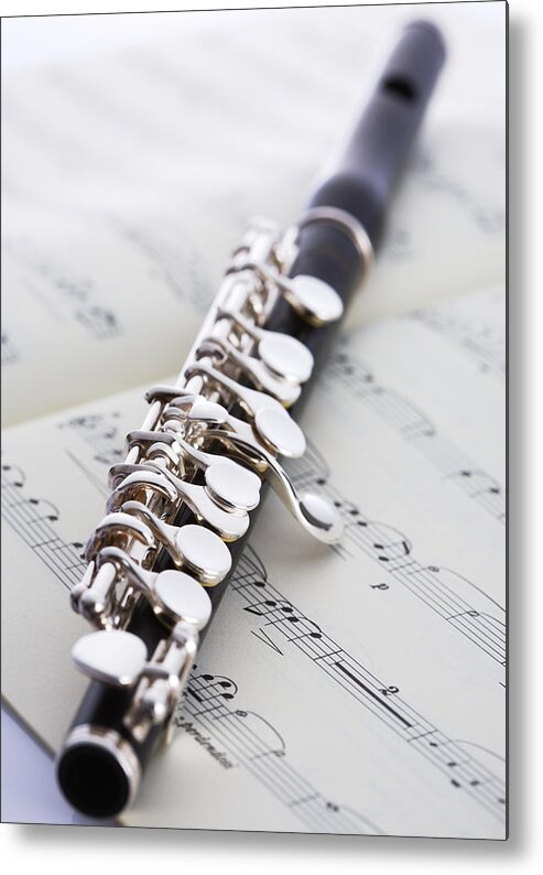 Sheet Music Metal Print featuring the photograph Piccolo On A Score by Imagenavi